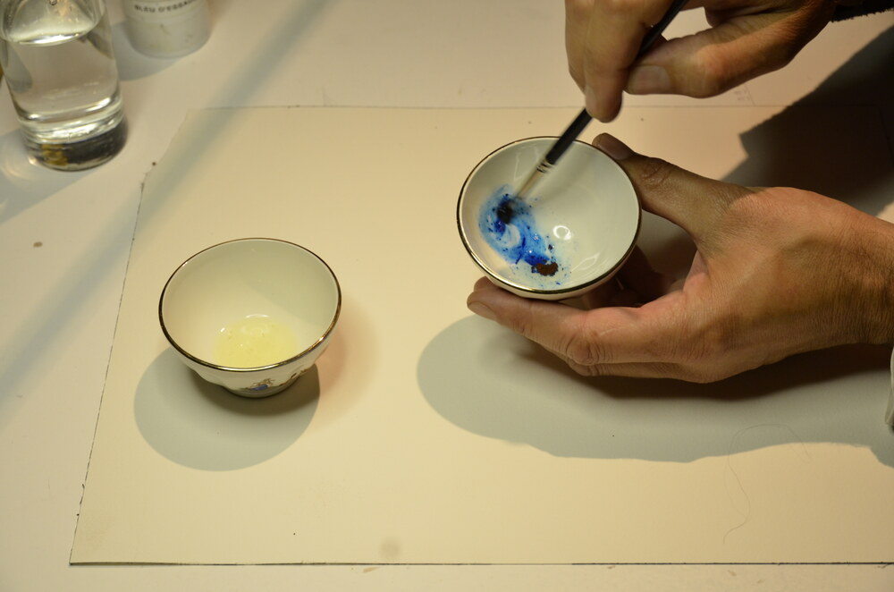 Mélange du pigment avec le blanc d'œuf